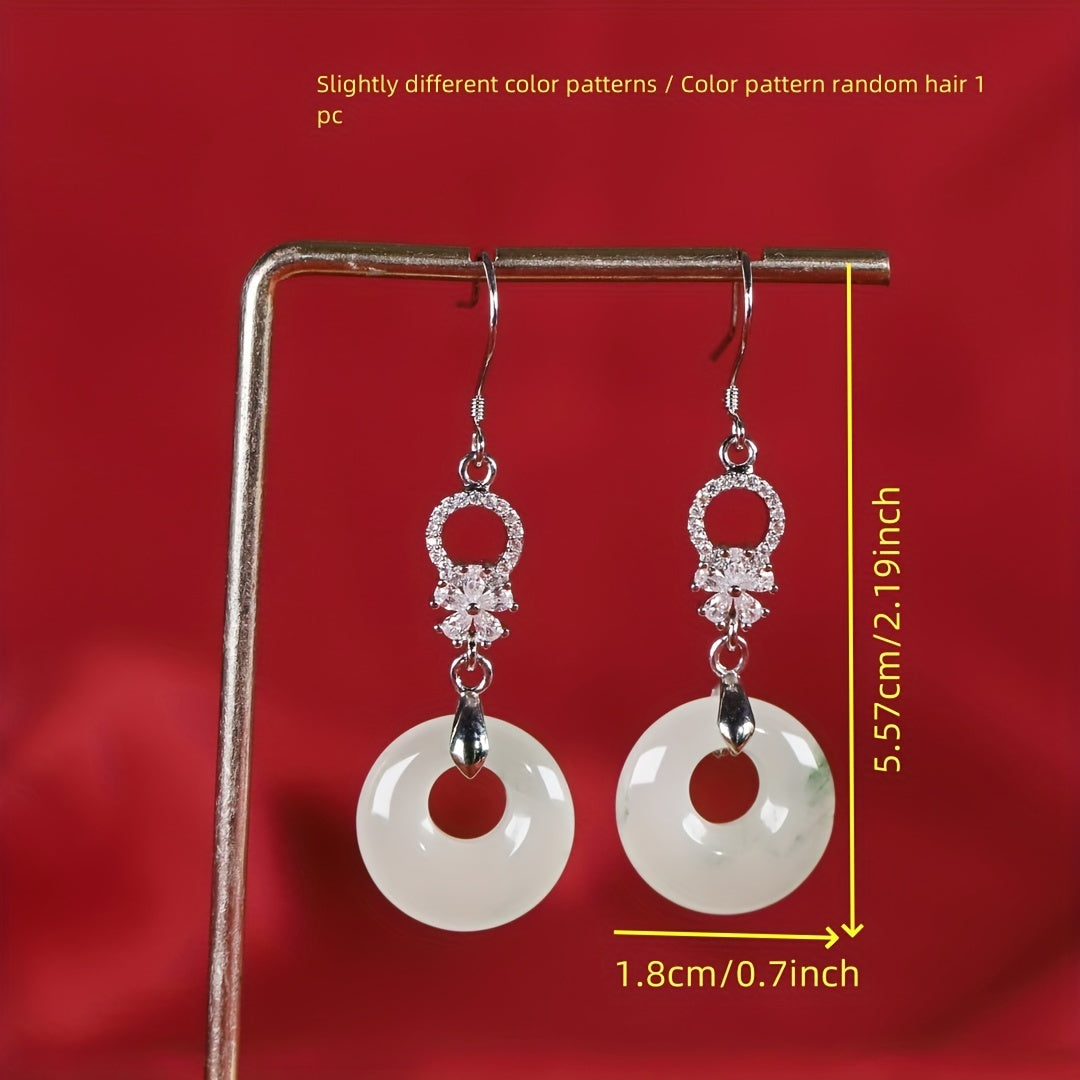 Detail of the double coin peace buckle design