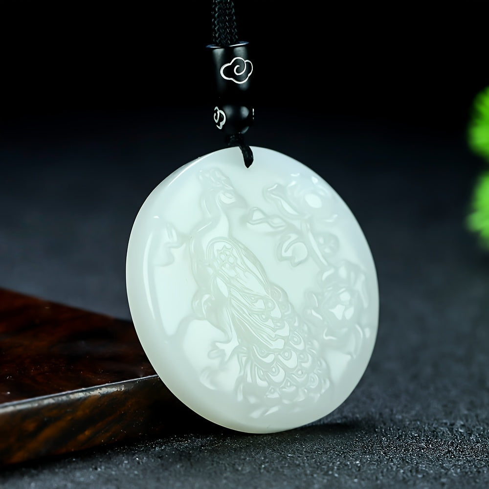 Side view of peacock pendant showing depth of carving