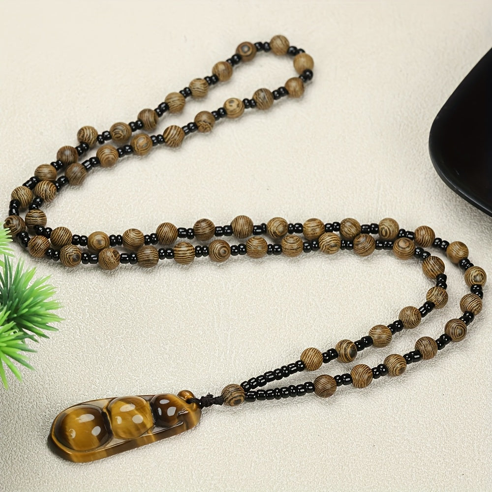 Close-up of amber bean pendant texture and polish