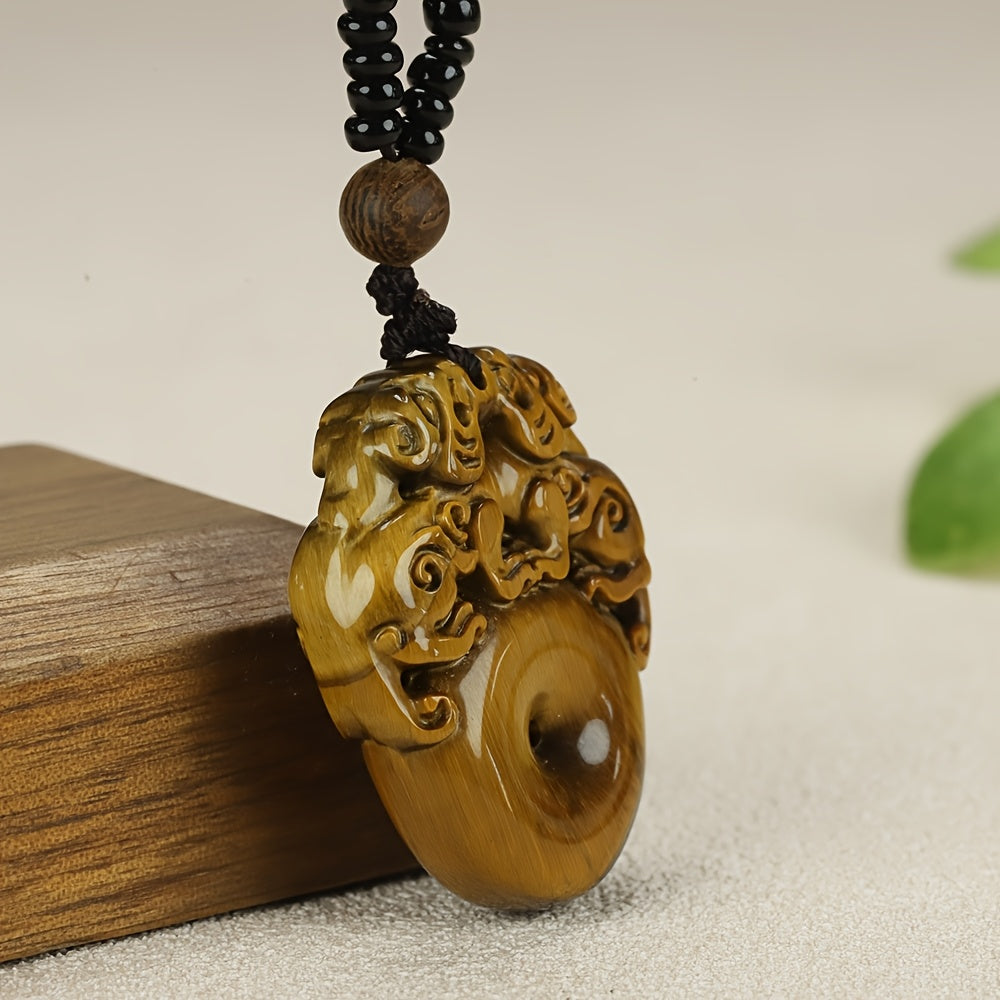 Pixiu pendant being worn as personal wealth talisman