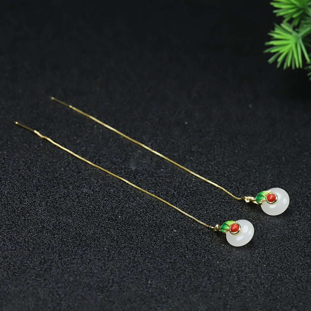 The earrings at rest in their box, a symbol of practice completed and ready to begin anew