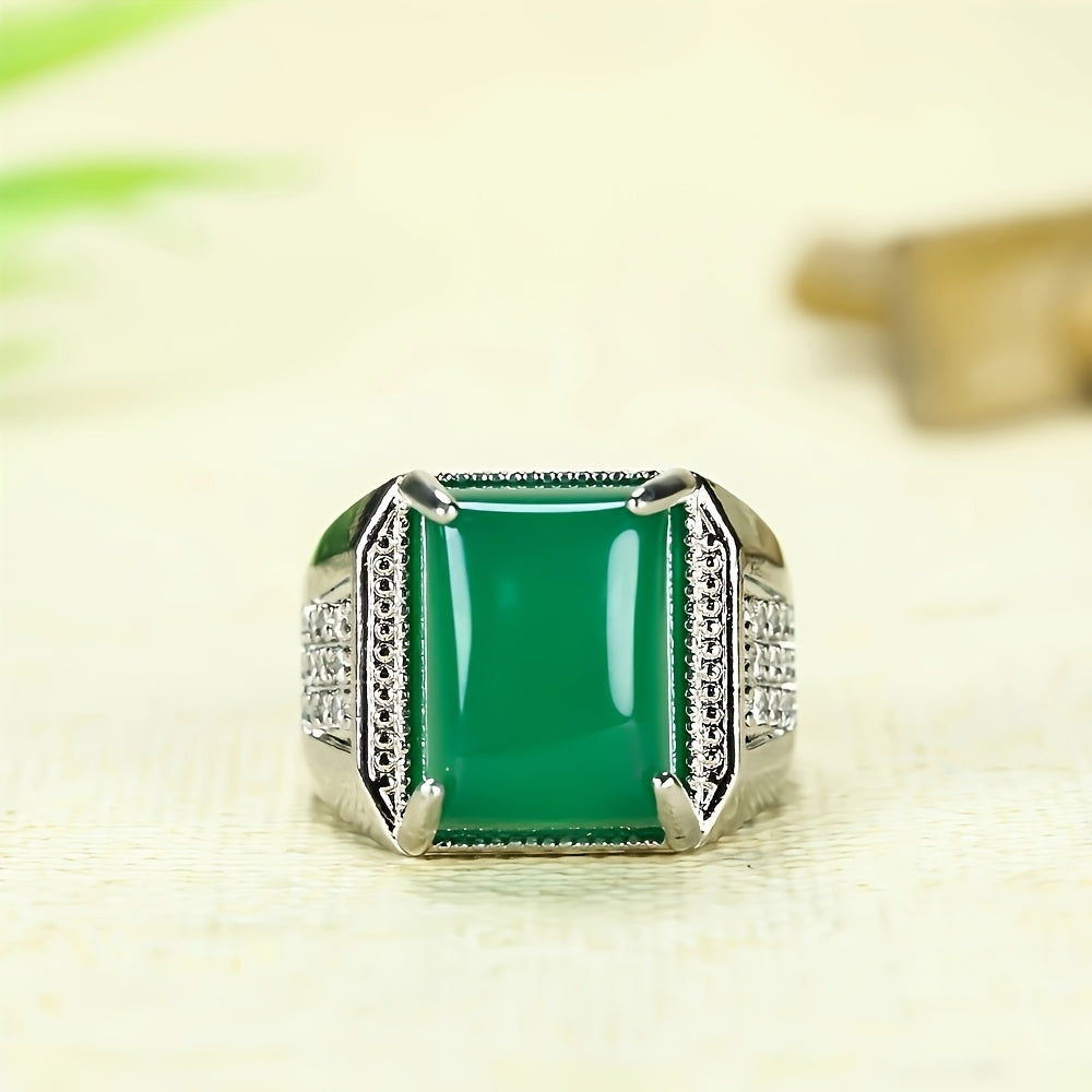 Close-up of the square-cut green agate in the men's ring